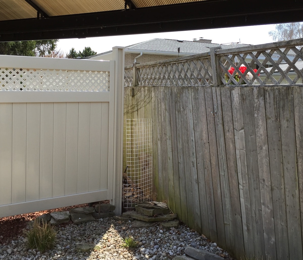 vinyl fence vs wood fence comparison in Niagara backyard